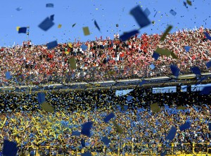 River Plate's (top) and Boca Juniors' supporters cheer for their teams